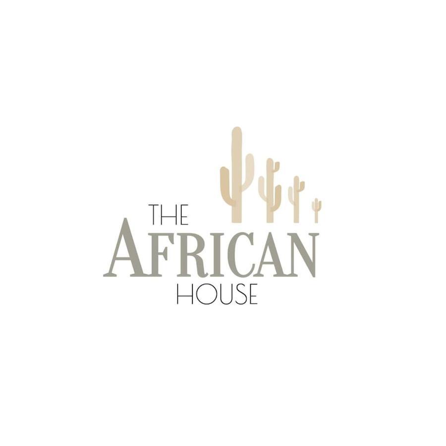 The African House โตล็อกซ์ ภายนอก รูปภาพ